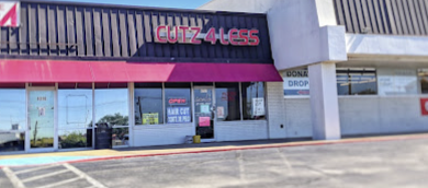 Cutz 4 Less storefront at North Park Plaza